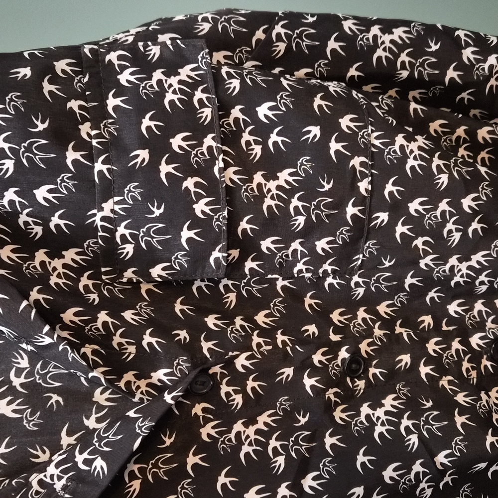 Black and White Bird Pattern Sleeveless Tied Button Up Blouse
